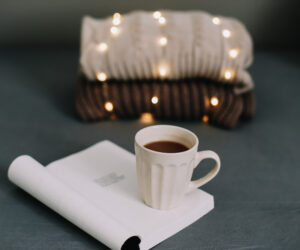 Cozy evening routine tea book warm lamp
